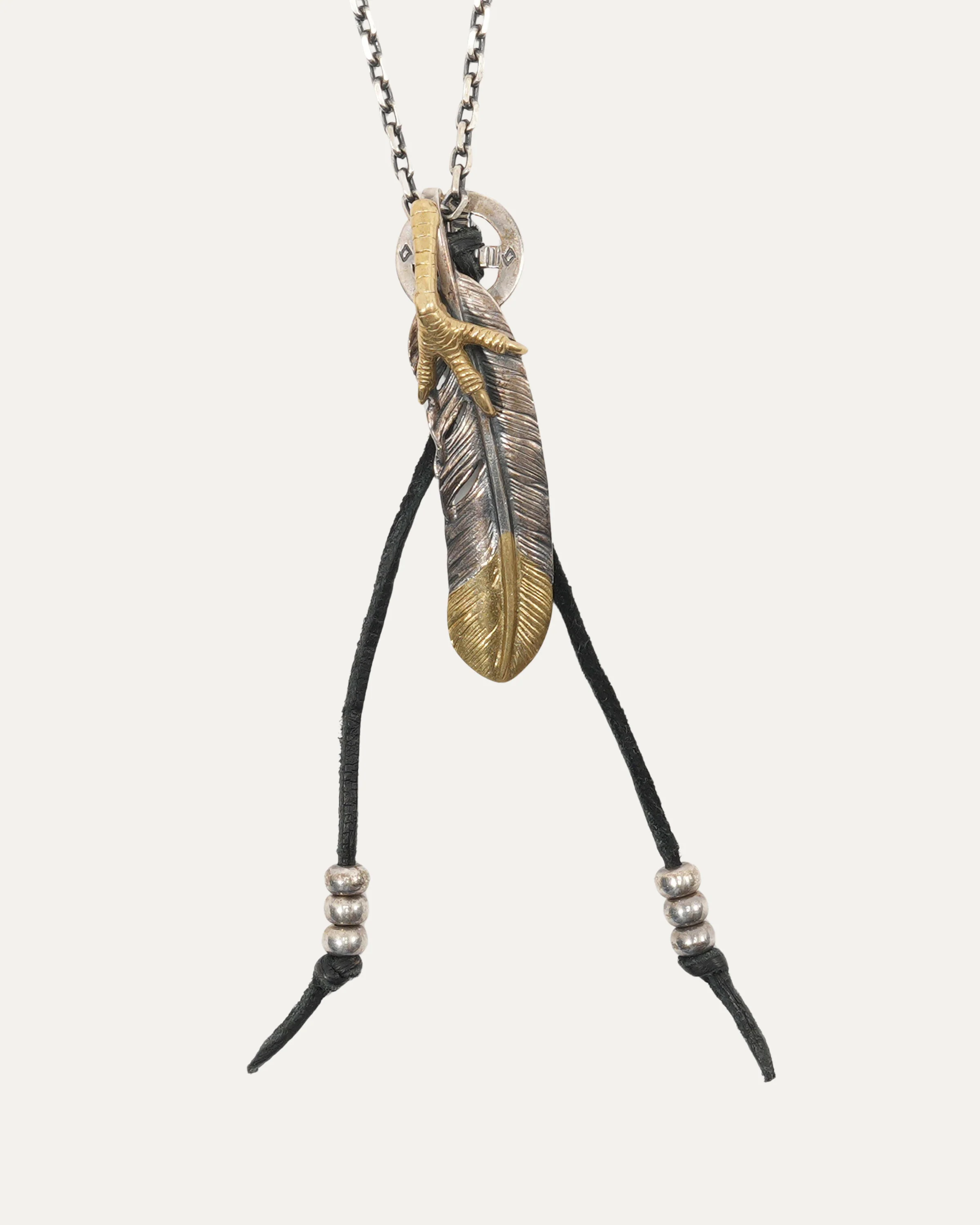 Silver Feather and Claw Pendant Necklace with Gold Detail - Image 4