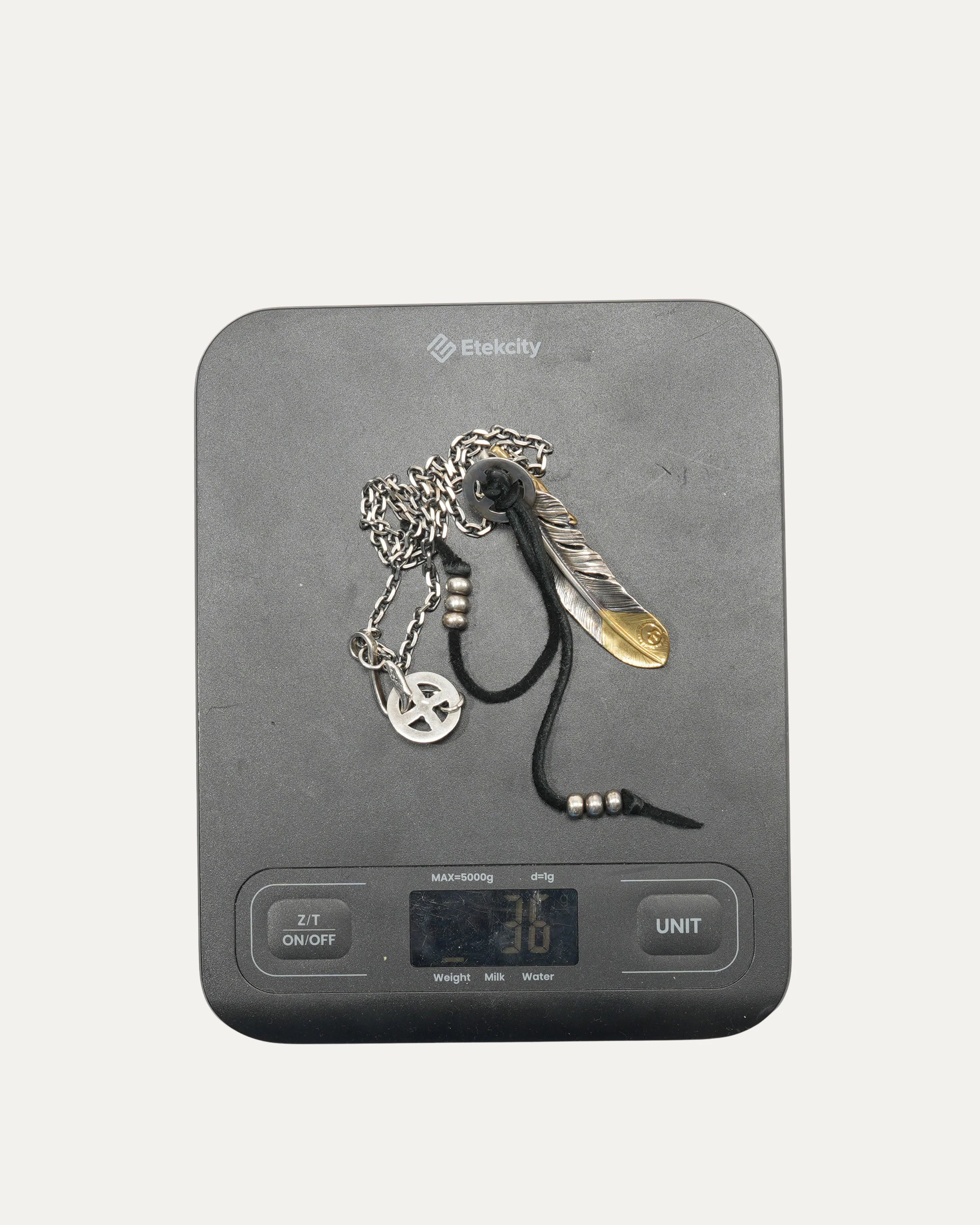 Silver Feather and Claw Pendant Necklace with Gold Detail - Image 5
